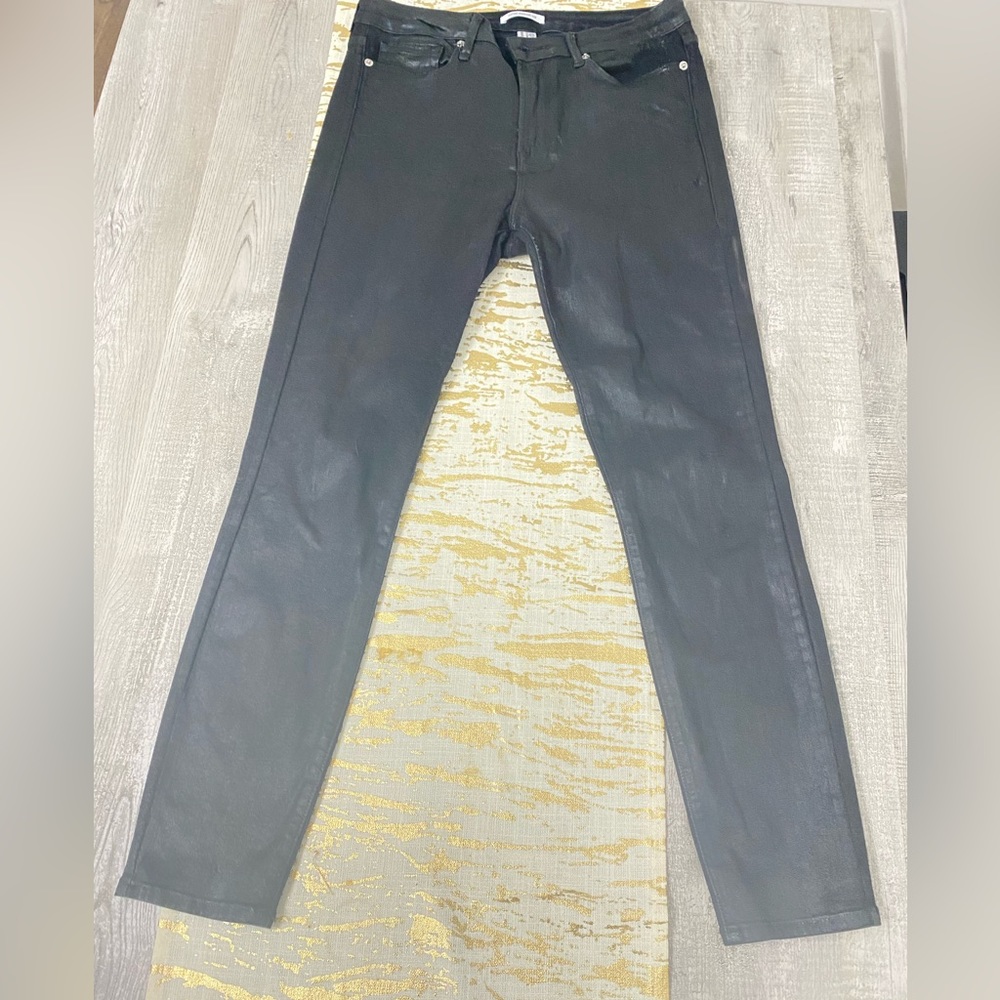 Good American coated black skinny jeans
